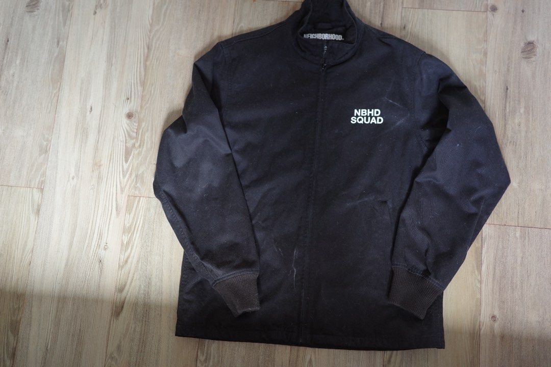 Neighborhood Tokyo Squad Black Jacket Size Medium (Category: Coats, Jackets and Outerwear) located in Santa Rosa. Submitted by mooseproject (Listing ID 1468754254, Image 1). Description: - Brand: Neighborhood Tokyo Squad - Color: Black - Size: Medium - Closure: Full zip front - Details: Ribbed cuffs and collar - Chest Print: White 'NBHD SQUAD' text on left chest - Back Print: Large graphic with 'NBHD 1994-2018', 'THE FILTH AND THE FURY', and 'CRA
