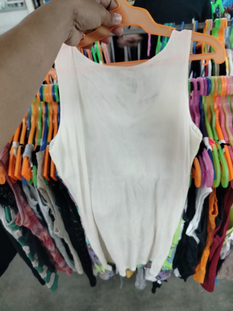 Neon green sequin patterned tank top (Category: Sleeveless) located in Manila. Submitted by virgiliosa38485 (Listing ID 1468719036, Image 3). Description: - Neon green sleeveless top with vibrant mandala and geometric prints - Covered in sparkling sequins along the front design - Plain white fabric on the back - Scoop neckline with a comfortable, relaxed fit - Ideal for parties, music festivals, or casual summer days - Easy to style with your fav