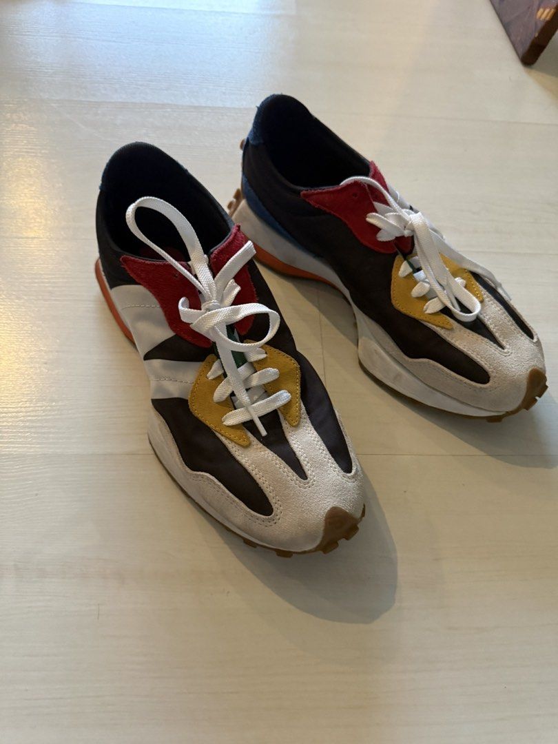 New Balance 327 Multicolour Suede Sneakers (Category: Sneakers) located in Makati City. Submitted by marckyboy (Listing ID 1468747810, Image 1). Description: - Brand: New Balance - Model: 327 Low-Top Trainers - Colorway: Bold mix of black, off-white, yellow, red, and blue - Materials: Premium suede and nylon panels - Design: Oversized white 'N' logo, chunky white midsole, and distinct studded gum rubber outsole - Condition: Clean soles and uppers