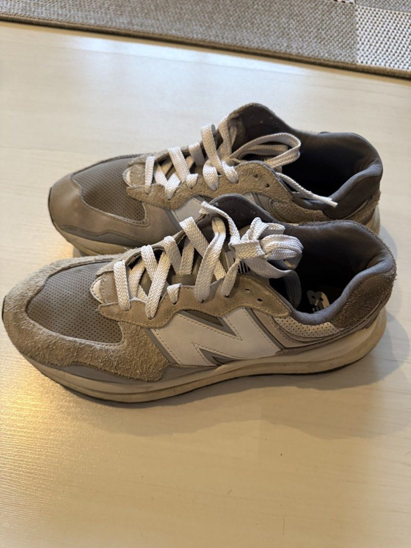 New Balance 574 Grey White Sneakers (Category: Sneakers) located in Makati City. Submitted by marckyboy (Listing ID 1468747631, Image 1). Description: - Brand: New Balance - Model: 574 - Color: Grey and White - Material: Suede and mesh upper with perforated toe box - Features: White laces and chunky midsole for classic comfort - Condition: Pre-owned with normal signs of wear on soles and uppers - Style: Versatile everyday runner - size 9 / 28cm i