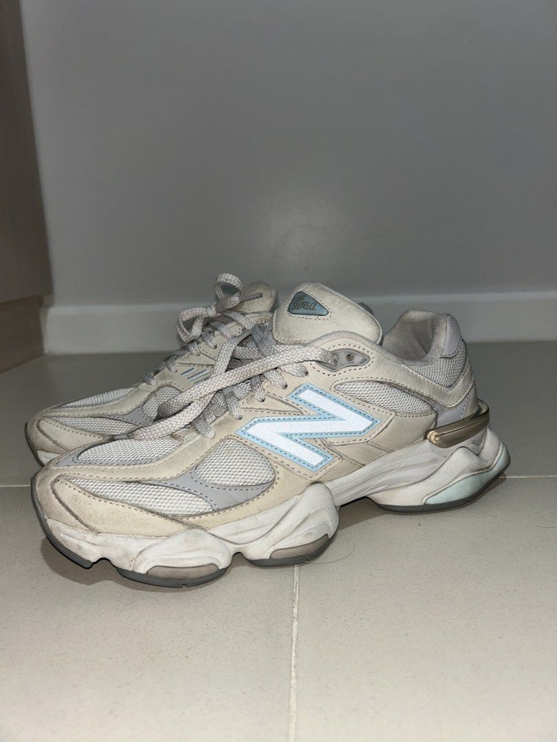 New Balance 9060 white (Category: Sneakers) located in Las Pinas. Submitted by copthesetops (Listing ID 1468803856, Image 1). Description: New Balance 9060 - Reflecting logo (first pic with flash, second with none) Size: 9.5 Mens Issue: Needs cleaning other than that all fine good quality pair .