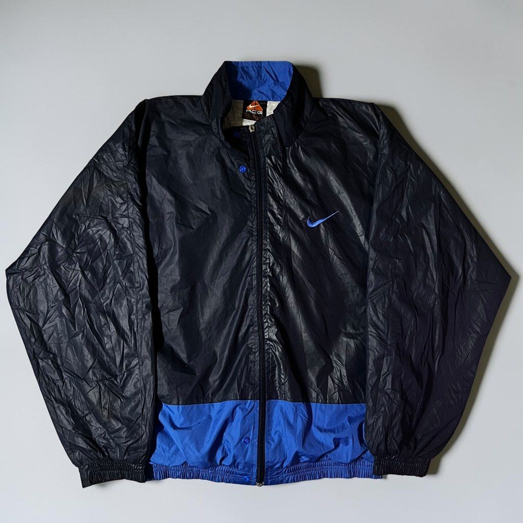 Nike ACG Windbreaker Jacket (Navy Blue) (Category: Coats, Jackets and Outerwear) located in Imus. Submitted by eyruh (Listing ID 1468892515, Image 1). Description: XL on tag 26 length / 25 width Color rate: 9.5/10 Excellent condition (Broken zippers).