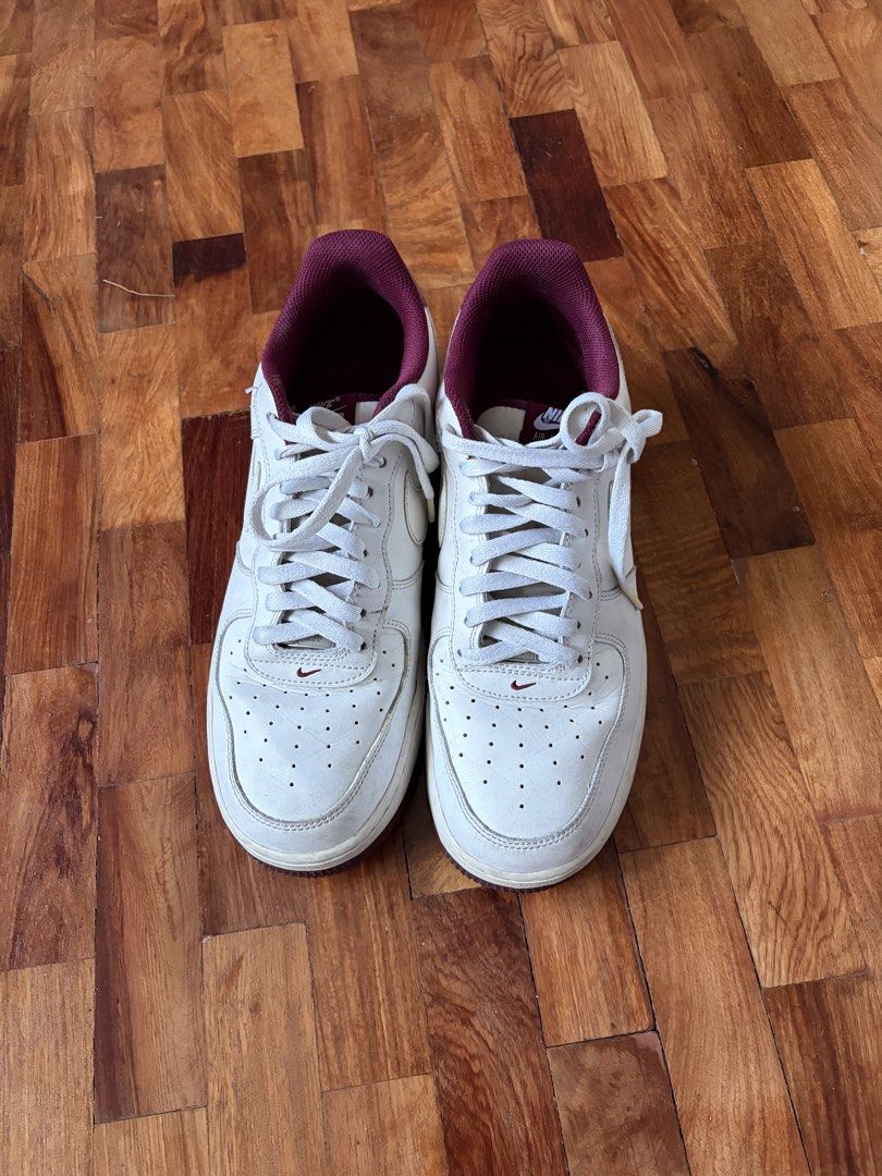 Nike Air Force 1 Low 'White Dark Beetroot' (US 11) (Category: Sneakers) located in Quezon City. Submitted by juanchoconsunji (Listing ID 1468795111, Image 2). Description: Released as part of the Air Force 1’s 40th Anniversary collection, the Nike Air Force 1 Low ‘Dark Beetroot’ blends classic simplicity with bold color accents. It features a smooth white leather base and matching white midsole, highlighted by rich Dark Beetroot (wine/burgundy) d