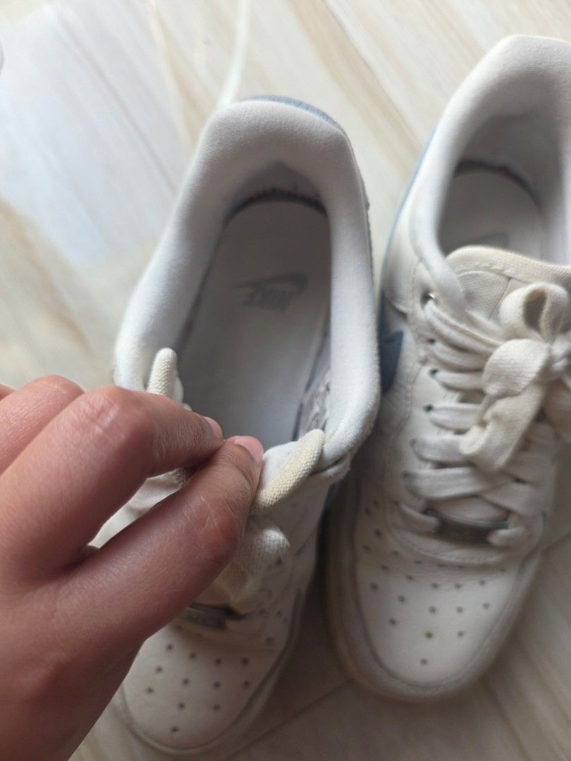 Nike Air Force 1 White Blue Size US 5.5 (Category: Sneakers) located in Santa Rosa. Submitted by verafaye (Listing ID 1468787042, Image 3). Description: - Brand/Model: Nike Air Force 1 Low (Style Code: DX1193-100) - Colorway: Classic white leather upper with bold blue swoosh accents - Size: US 5.5, UK 3, EUR 36 - Perfect everyday streetwear sneakers! Bought it in Nike the Fort for 6,000PHP. No box and sellingit very low now 😊.