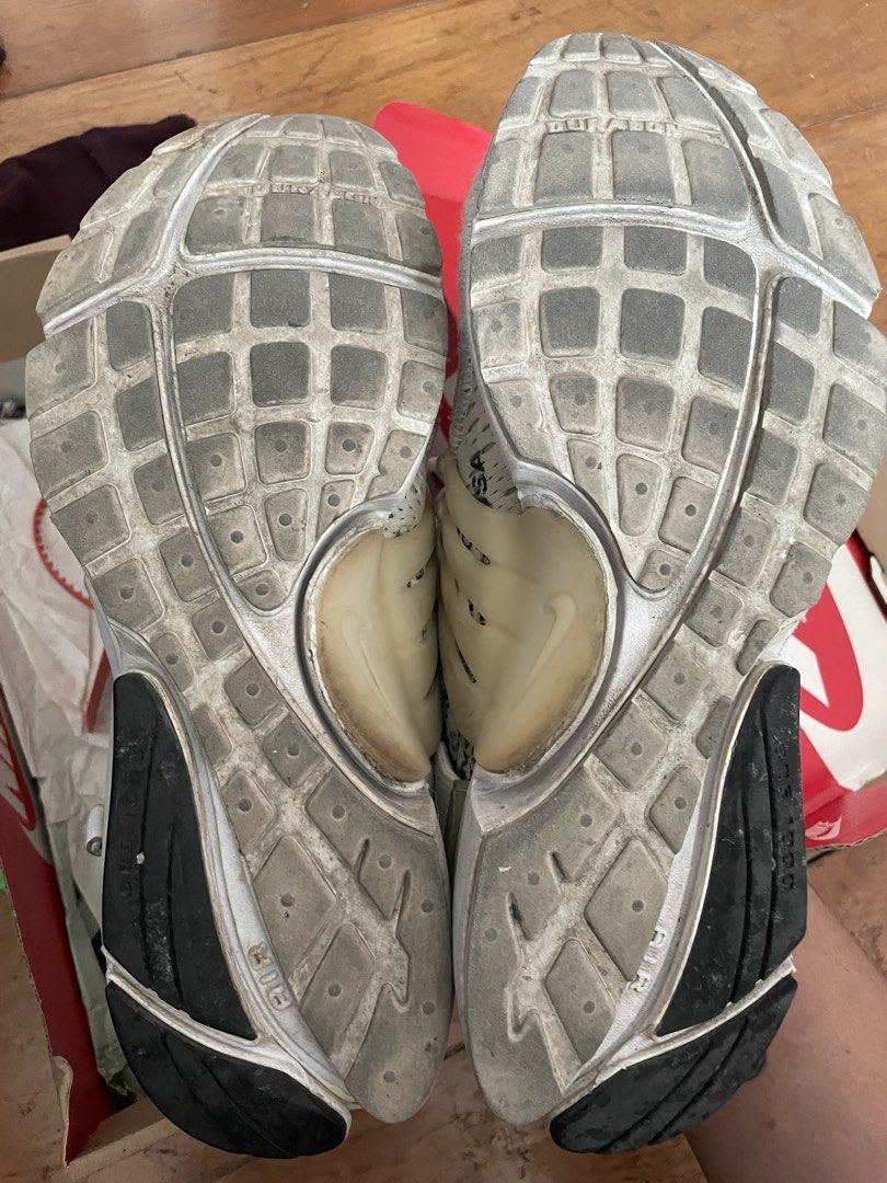 Nike Air Presto Off-White (Category: Sneakers) located in Angono. Submitted by marketplacesellerph610 (Listing ID 1468754207, Image 3). Description: - Brand: Nike x Off-White Air Presto - Style: Iconic deconstructed design with signature orange tab and strap text details - Condition: Signs of aging with natural yellowing on the translucent cage and sole; minor wear on the bottom tread - Inclusion: Complete with original box - Trusted seller: Deal