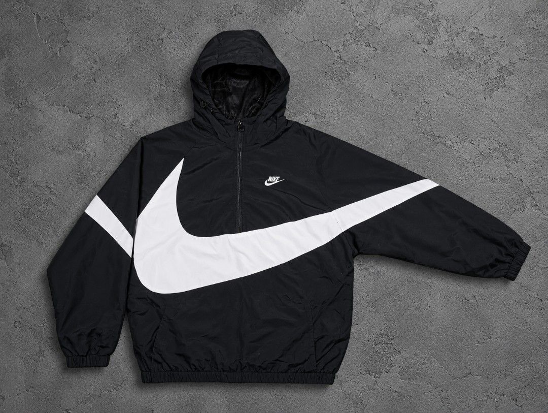 Nike big swoosh anorak 🫶 (Category: Coats, Jackets and Outerwear) located in Manila. Submitted by thrifterzz_ph (Listing ID 1468736440, Image 1). Description: Dimes: W-24/L-27 (M-L) Issue: none (removable stain) color rate: 9/10 very good condition.