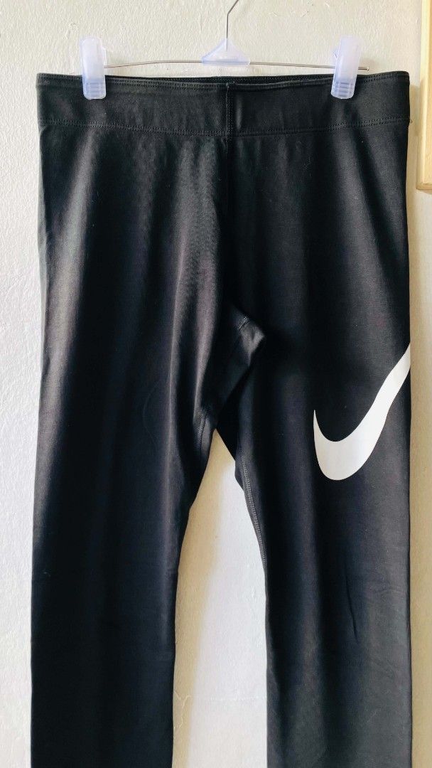 Nike Black Leggings (Category: Activewear) located in San Mateo. Submitted by safeearth21 (Listing ID 1468737335, Image 3). Description: - Brand: Nike - Color: Black with white swoosh logos on leg and hip - Size: S (Waist: 28", Length: 35") - Origin: Made in Sri Lanka - Fit: Stretchy, comfortable athletic wear - Condition: Excellent - Perfect for gym, running, or everyday casual wear - Feel free to PM for questions or fast checkout!.