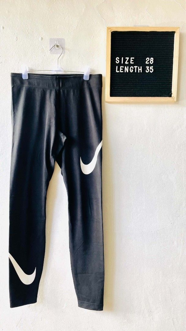 Nike Black Leggings (Category: Activewear) located in San Mateo. Submitted by safeearth21 (Listing ID 1468737335, Image 1). Description: - Brand: Nike - Color: Black with white swoosh logos on leg and hip - Size: S (Waist: 28", Length: 35") - Origin: Made in Sri Lanka - Fit: Stretchy, comfortable athletic wear - Condition: Excellent - Perfect for gym, running, or everyday casual wear - Feel free to PM for questions or fast checkout!.