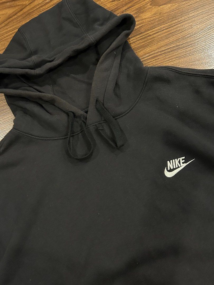 Nike Black Pullover Hoodie (Category: Hoodies) located in Manila. Submitted by 144thrift_shits (Listing ID 1468728347, Image 2). Description: Nike Club Fleece Pullover Hoodie (Black) Size on tag: Large Dimes: 25x28 Color rate 9/10 Condition: 9/10 Issue: Minimal Sun fade 🏷️: 500+ sf.