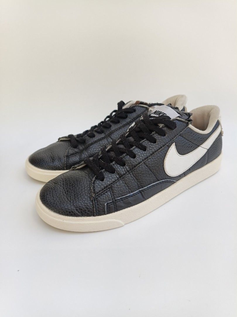 Nike Blazer Low Black White Leather Sneakers (Category: Sneakers) located in Imus. Submitted by grindhouse.thriftshop (Listing ID 1468760636, Image 1). Description: - Brand/Model: Nike Blazer Low - Colorway: Black and white with contrast white swoosh - Material: Pebbled leather upper - Design: Classic low-top with standard Nike tongue branding and black laces - Condition: Well-worn with minor creasing and some wear on the soles - Perfect for ever