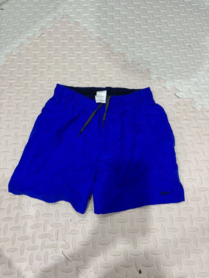 Nike Blue Shorts Size S (Category: Shorts) located in Manila. Submitted by noribrahim.20 (Listing ID 1468873349, Image 1). Description: - Brand: Nike - Condition: Brand new with tags (BNWT) - Color: Bright blue - Size: Men's Small - Material: 100% polyester (inside and out) - Features: Elastic waistband with drawstring, embroidered black Nike swoosh on lower left leg - Origin: Made in Indonesia.