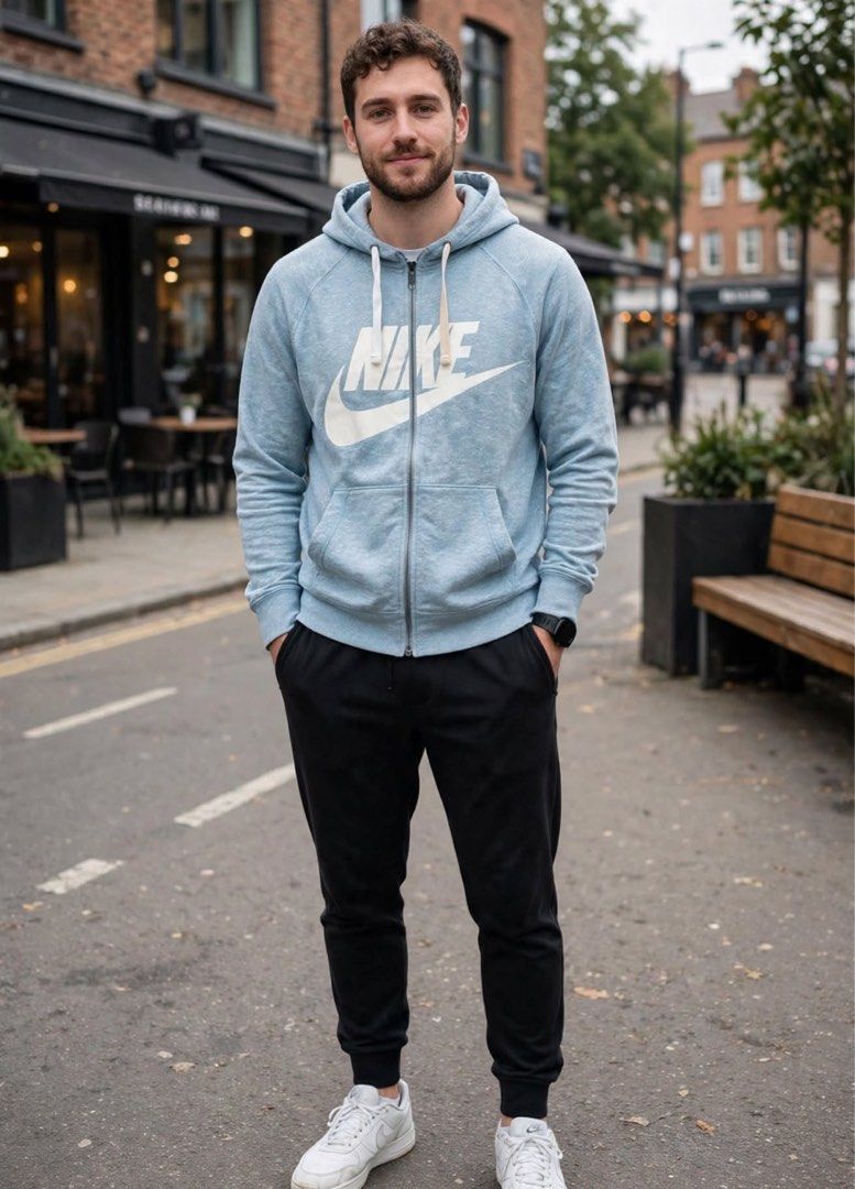 Nike Blue Zip Up Hoodie Unisex (Category: Coats, Jackets and Outerwear) located in San Pedro. Submitted by lifebeginsaftercoff33 (Listing ID 1468762995, Image 2). Description: - Brand: Nike - Color: Blue heathered - Size: M on tag - Dimes: 20 x 25 - Design: Large white logo graphic across the chest - Features: Front zip closure, adjustable hood drawstrings, two front pockets, and ribbed cuffs/hem - In very good condition - very soft comfy light s