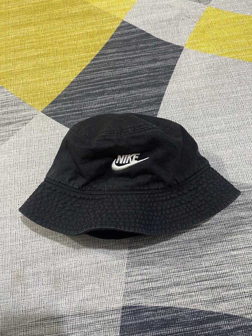 Nike bucket hat (Category: Caps & Hats) located in Taytay. Submitted by ekselentekondisyon (Listing ID 1468846406, Image 1). Description: Nike bucket hat Unisex Medium-large size Good condition Taytay rizal location Embroided logo design No issue.