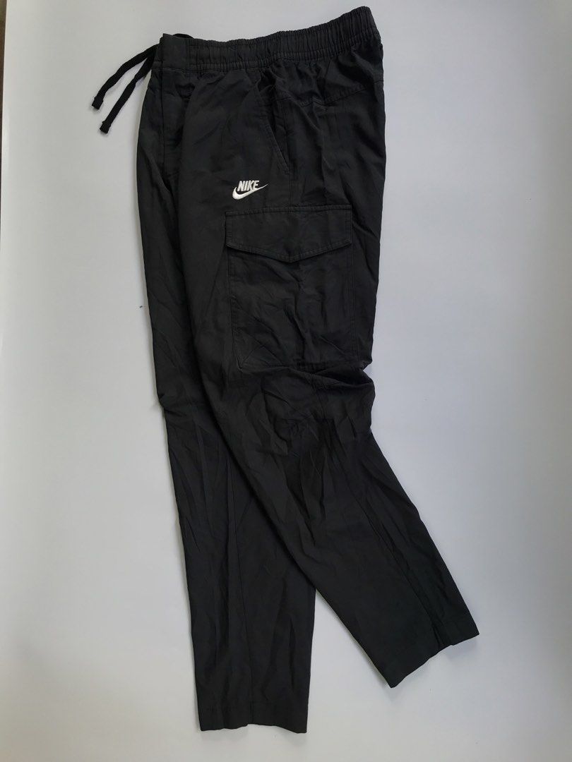 NIKE CARGO WOVEN PANTS (Category: Joggers) located in Aurora. Submitted by thrillthriftfinds123 (Listing ID 1468858233, Image 1). Description: NIKE CARGO WOVEN PANTS SIZE SMALL ON TAG NO ISSUE GOOD CONDITION WHITE TAG SOLID NITO GUYS 9.5 COLOR RATE .