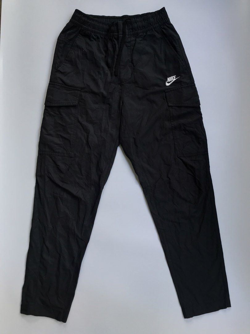 NIKE CARGO WOVEN PANTS (Category: Joggers) located in Aurora. Submitted by thrillthriftfinds123 (Listing ID 1468858233, Image 2). Description: NIKE CARGO WOVEN PANTS SIZE SMALL ON TAG NO ISSUE GOOD CONDITION WHITE TAG SOLID NITO GUYS 9.5 COLOR RATE .