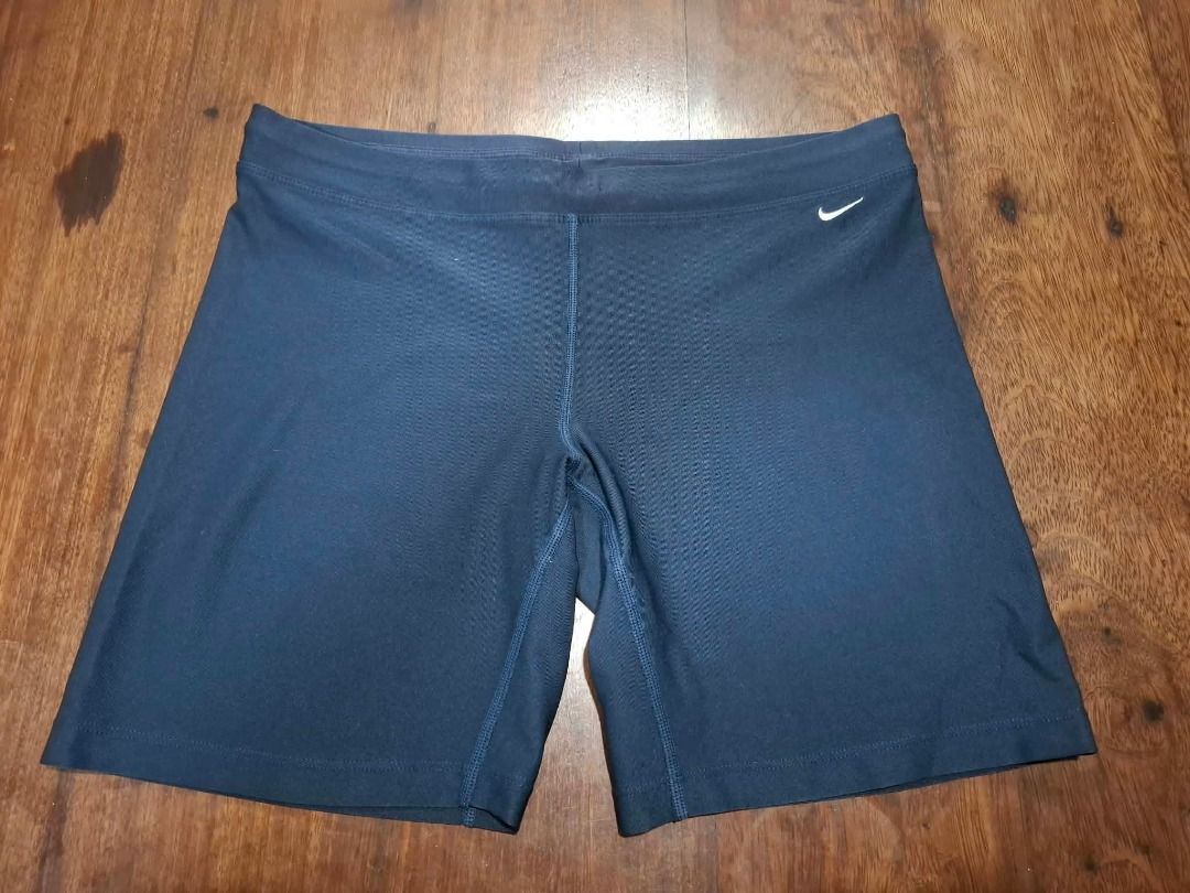 NIKE Dark Fitted Workout Shorts (Category: Activewear) located in Pasig City. Submitted by dripcounty (Listing ID 1468838732, Image 1). Description: NIKE Dark Fitted Workout Shorts ₱250 Size: Unconfirmed — please confirm in chat Condition: Preloved; please check actual photos Dark fitted workout shorts with a wide waistband and swoosh detail. Actual item shown in photos. Delivery fee shouldered by buyer (Lalamove / other courier). Item price excl