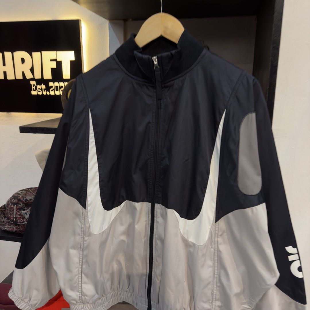 Nike Double Swoosh Tritone Windbreaker (Category: Coats, Jackets and Outerwear) located in Manila. Submitted by jerichomal82553 (Listing ID 1468919892, Image 2). Description: Nike Double Swoosh Tritone Windbreaker 29.5 by 27 Good Condition Complete Tags .
