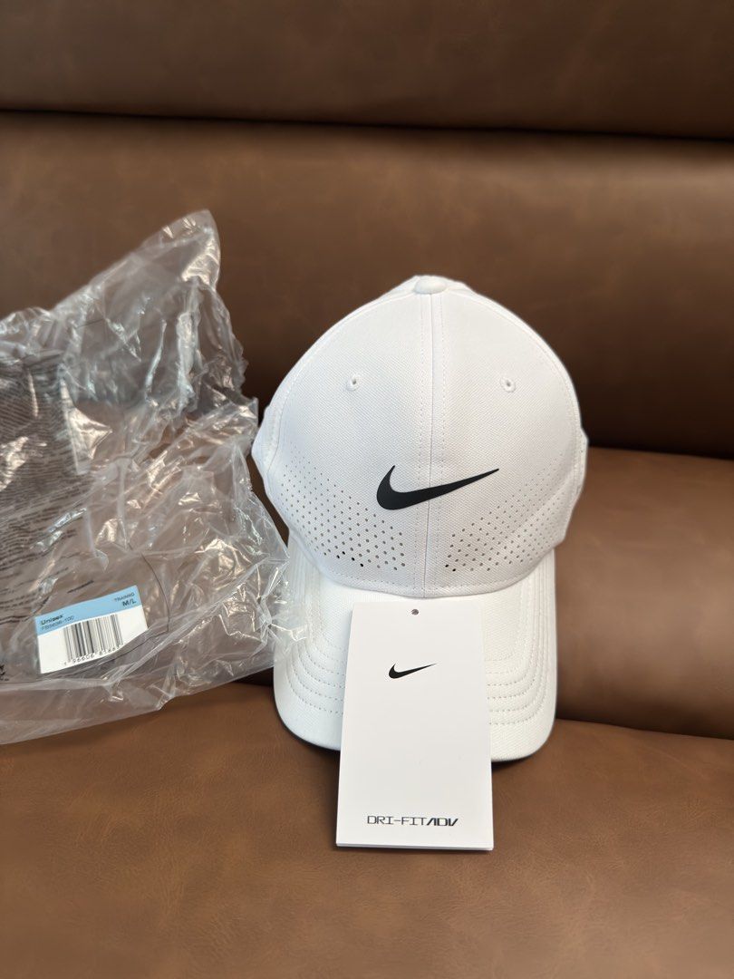 Nike Dri-FIT ADV Flex Rise Training Cap White M/L (Category: Caps & Hats) located in Davao. Submitted by achi.castillo (Listing ID 1468715538, Image 1). Description: - Brand new with original tags and plastic packaging - Nike Dri-FIT ADV Flex Rise training hat in clean white - Size: M/L - Perforated panels all around for maximum breathability and airflow - Iconic black Swoosh logo on the front and subtle grey Dri-FIT ADV lettering on the side.