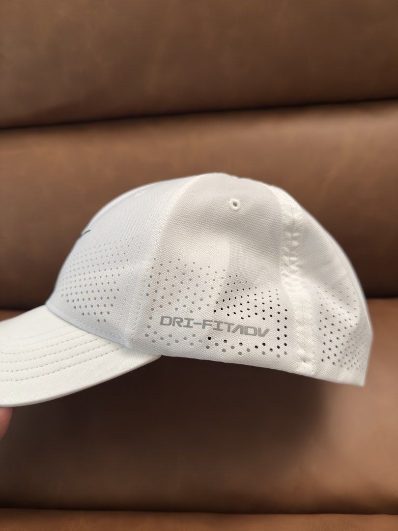 Nike Dri-FIT ADV Flex Rise Training Cap White M/L (Category: Caps & Hats) located in Davao. Submitted by achi.castillo (Listing ID 1468715538, Image 2). Description: - Brand new with original tags and plastic packaging - Nike Dri-FIT ADV Flex Rise training hat in clean white - Size: M/L - Perforated panels all around for maximum breathability and airflow - Iconic black Swoosh logo on the front and subtle grey Dri-FIT ADV lettering on the side.