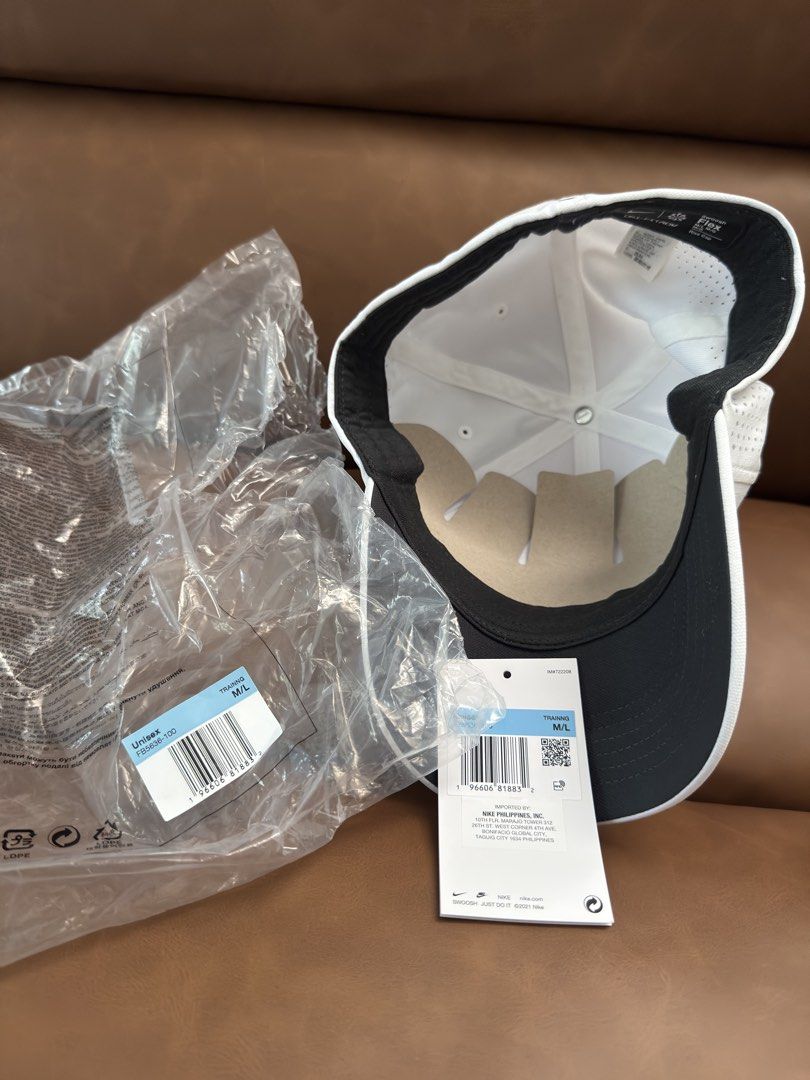 Nike Dri-FIT ADV Flex Rise Training Cap White M/L (Category: Caps & Hats) located in Davao. Submitted by achi.castillo (Listing ID 1468715538, Image 3). Description: - Brand new with original tags and plastic packaging - Nike Dri-FIT ADV Flex Rise training hat in clean white - Size: M/L - Perforated panels all around for maximum breathability and airflow - Iconic black Swoosh logo on the front and subtle grey Dri-FIT ADV lettering on the side.