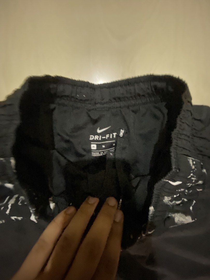 Nike Dri-FIT Black and White Pattern Athletic Shorts Size M (Category: Shorts) located in Vinzons. Submitted by gabrielvic (Listing ID 1468738052, Image 2). Description: - Brand: Nike - Style: Dri-FIT athletic shorts with black and white graphic pattern - Size: Medium - Waist: Elastic waistband with adjustable drawstring - Material: Lightweight and breathable - Condition: Clean with interior tags intact - Best for: Workouts, sports, or casual str