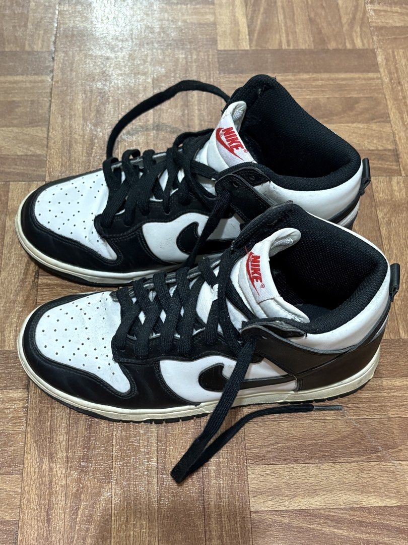 Nike Dunk High Panda Black White (Category: Sneakers) located in Manila. Submitted by nykji96 (Listing ID 1468714935, Image 2). Description: - Model: Classic Panda High Dunks (Black & White) - Material: Leather upper with perforated toe box and black swoosh - Sole: Solid black rubber outsole with great traction - Condition: Midsole has slight yellowing from age and wear; laces included - Style: Versatile everyday staple that goes with any outfit.