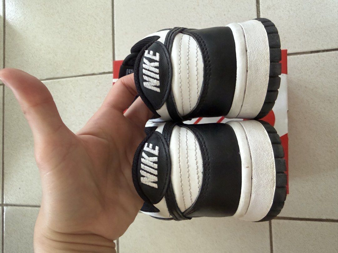 Nike Dunk Low Panda White Black GS (Category: Sneakers) located in Cebu City. Submitted by gfaith08 (Listing ID 1468749005, Image 3). Description: Size: 5Y (UK 4.5, EUR 37.5, 23.5 cm) - Condition: Clean pair with minimal wear - Includes: Original red Nike box .