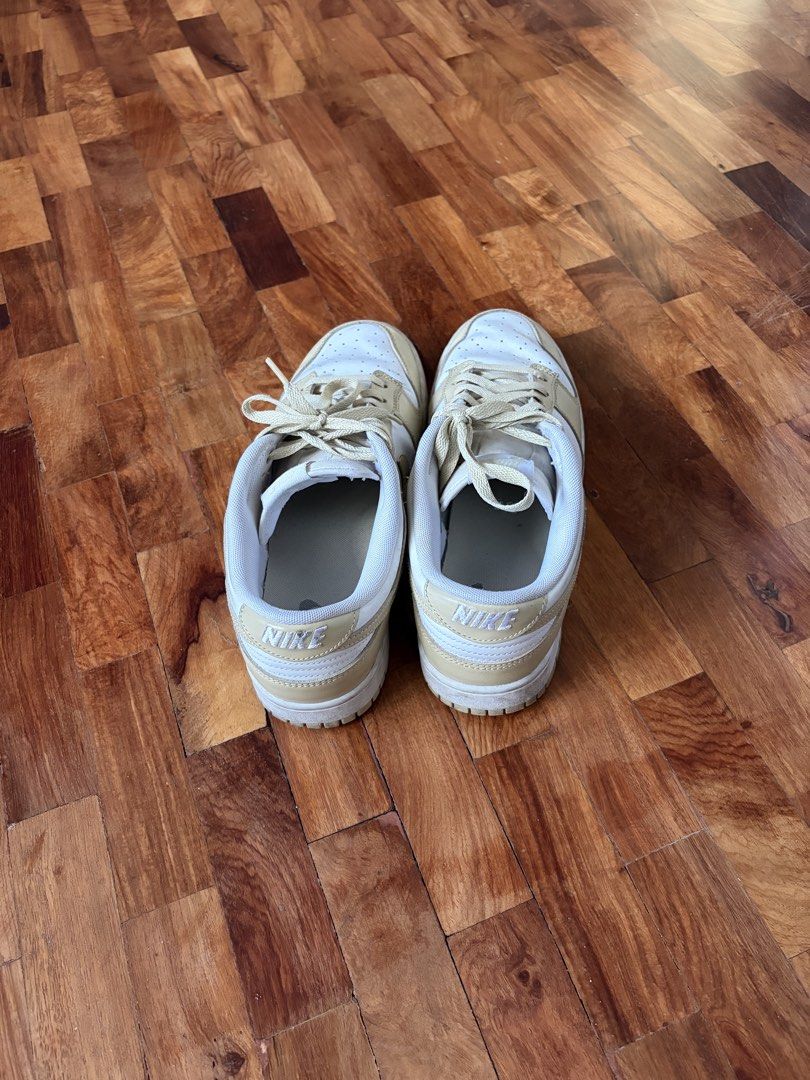 Nike Dunk Low 'Team Gold' (US 10.5) (Category: Sneakers) located in Quezon City. Submitted by juanchoconsunji (Listing ID 1468794584, Image 2). Description: Designed around a timeless two-tone look, the Nike Dunk Low ‘Team Gold’ features a clean white crisp leather upper accented by warm Team Gold leather overlays, matching swoosh logos, laces, and outsoles. Equipped with standard breathable mesh tongues and lining, this colorway offers a versati