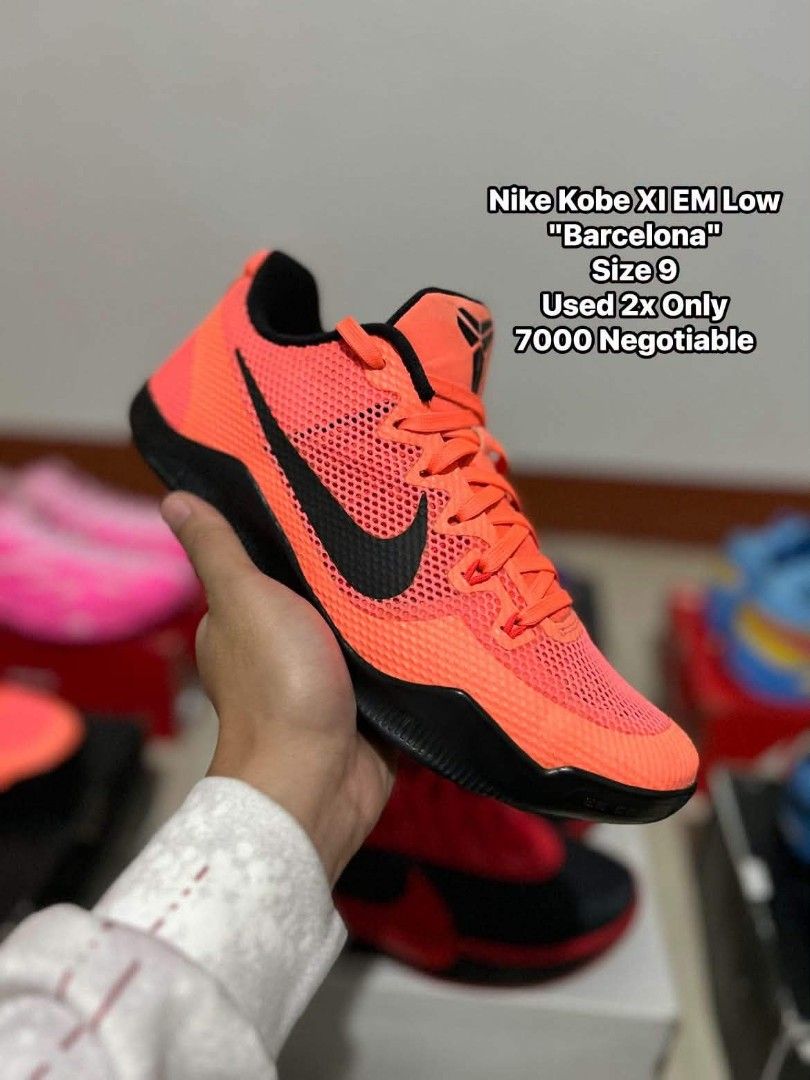 Nike Kobe XI EM Low Barcelona (Category: Sneakers) located in Quezon City. Submitted by bertsonamilasolidshoes (Listing ID 1468922595, Image 1). Description: - Brand: Nike - Model: Kobe XI EM Low "Barcelona" - Colorway: Bright orange mesh upper with black Swoosh and black sole - Size: US 9 - Condition: Worn twice only, very clean pair - Performance: Great traction and vibrant colorway that stands out on court.
