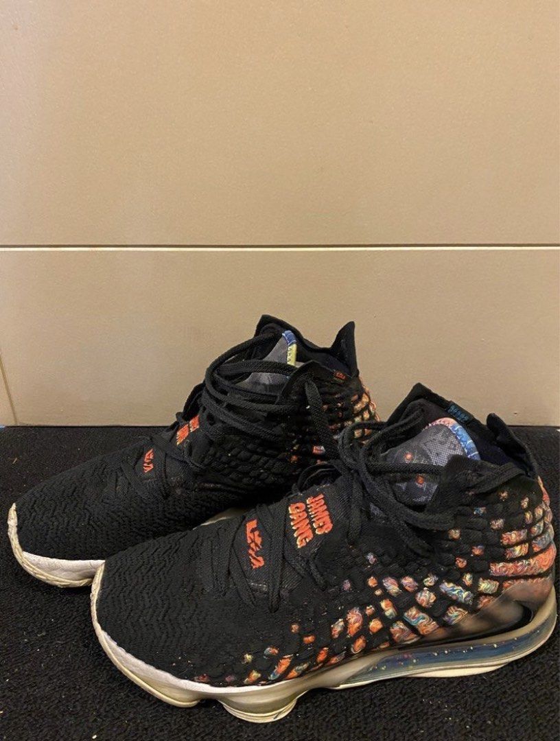 Nike LeBron 17 James Gang (Category: Sneakers) located in Pasig City. Submitted by yopops (Listing ID 1468781364, Image 1). Description: - Brand/Model: Nike LeBron 17 James Gang - Size: US 10 / UK 9 / EUR 44 - Colorway: Black knit upper with vibrant multicolored accents and James Gang tongue branding - Condition: Worn with moderate tread wear and a minor scuff on the outsole (see circled photo) - Packaging: No original box included - Ideal for ho