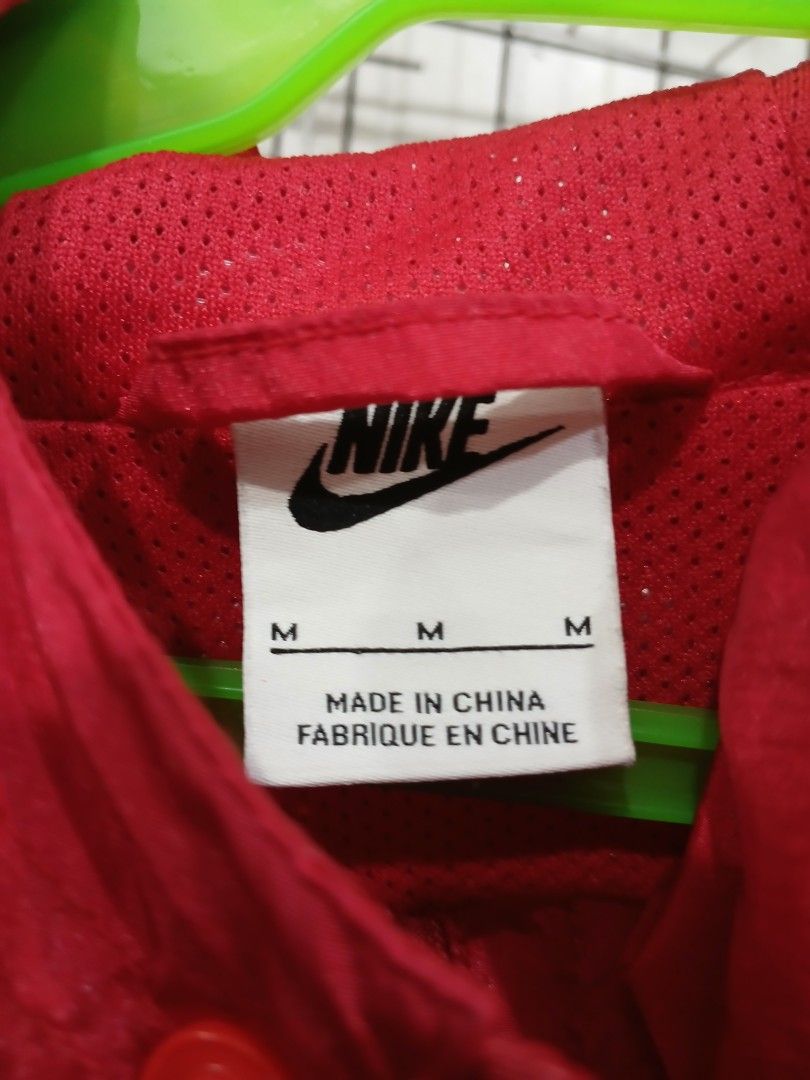Nike Red White Black Windrunner Jacket Size M (Category: Coats, Jackets and Outerwear) located in Manila. Submitted by zackthrift16 (Listing ID 1468714520, Image 3). Description: - Brand: Nike - Style: Windrunner jacket / Color block (Red, White, Black) - Size: Medium - Design: Big swoosh logo across the front - Features: Hooded, zip-up closure, breathable mesh lining, elastic cuffs and hem - Vibe: Classic, lightweight streetwear piece.