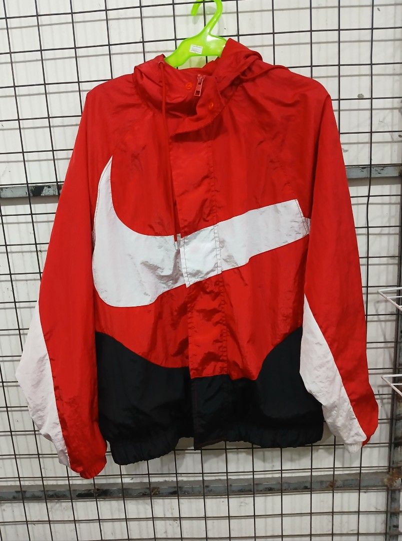 Nike Red White Black Windrunner Jacket Size M (Category: Coats, Jackets and Outerwear) located in Manila. Submitted by zackthrift16 (Listing ID 1468714520, Image 1). Description: - Brand: Nike - Style: Windrunner jacket / Color block (Red, White, Black) - Size: Medium - Design: Big swoosh logo across the front - Features: Hooded, zip-up closure, breathable mesh lining, elastic cuffs and hem - Vibe: Classic, lightweight streetwear piece.