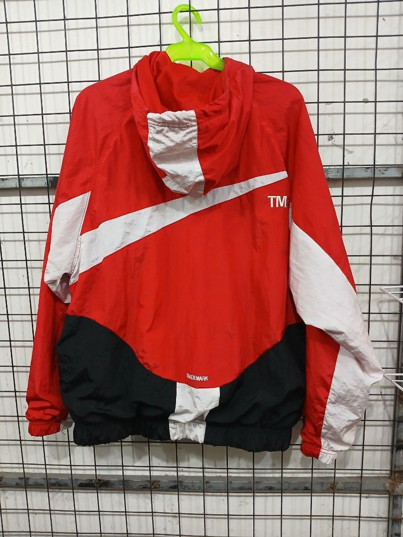 Nike Red White Black Windrunner Jacket Size M (Category: Coats, Jackets and Outerwear) located in Manila. Submitted by zackthrift16 (Listing ID 1468714520, Image 2). Description: - Brand: Nike - Style: Windrunner jacket / Color block (Red, White, Black) - Size: Medium - Design: Big swoosh logo across the front - Features: Hooded, zip-up closure, breathable mesh lining, elastic cuffs and hem - Vibe: Classic, lightweight streetwear piece.