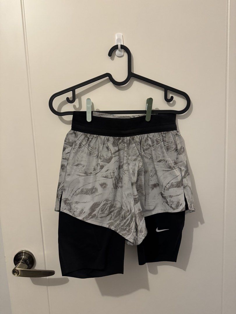 Nike Running Shorts (Category: Shorts) located in Mandaluyong City. Submitted by vielscloset (Listing ID 1468851327, Image 1). Description: Nike Running Shorts (XS) - 10/10 condition - Never been used; brand new.