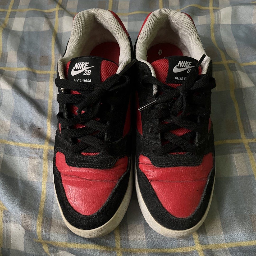 Nike SB Delta Force Black Red Skate Shoes (Category: Sneakers) located in Cabuyao City. Submitted by ricomalic (Listing ID 1468738721, Image 2). Description: Thrifted/preloved Nike SB Delta Force sneakers. Classic red, black, and white colorway, perfect for casual and streetwear fits. Condition: Needs cleaning. Has visible creasing, dirt, and signs of use. Please check photos for actual condition. Size : US 5 / UK 4.5 / EU 37.5 / 23.5cm (please d