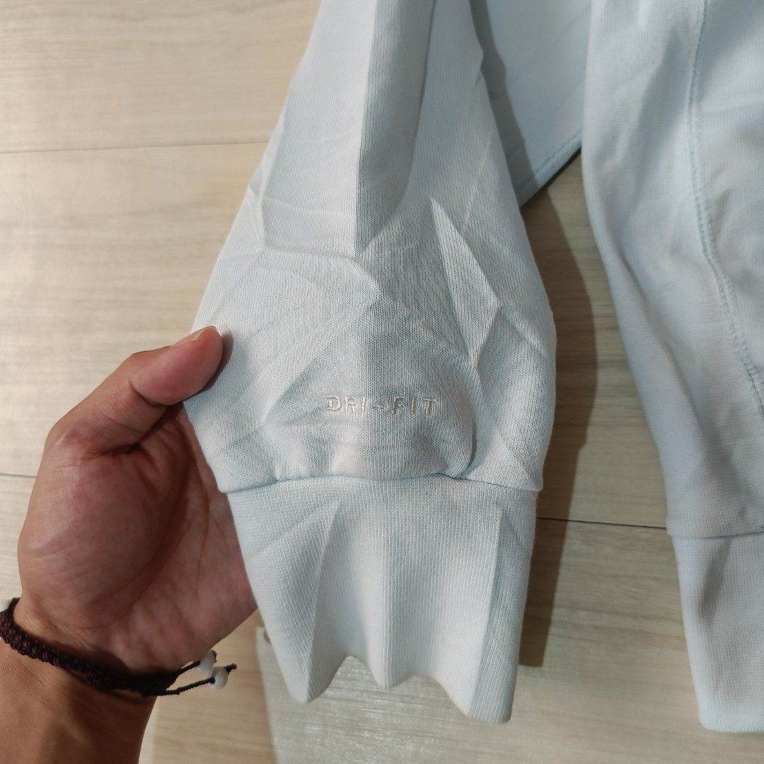 Nike Standard Issue Dri-FIT Light Blue Sweatshirt Size L (Category: Coats, Jackets and Outerwear) located in Manila. Submitted by ghello99 (Listing ID 1468847707, Image 3). Description: - Brand: Nike Standard Issue - Color: Light Blue - Size: L (label on collar) - Material/Tech: Dri-FIT moisture management, soft textured fabric inside and out - Details: Small embroidered Nike swoosh on left chest, woven Standard Issue tag near bottom hem - Fit: C
