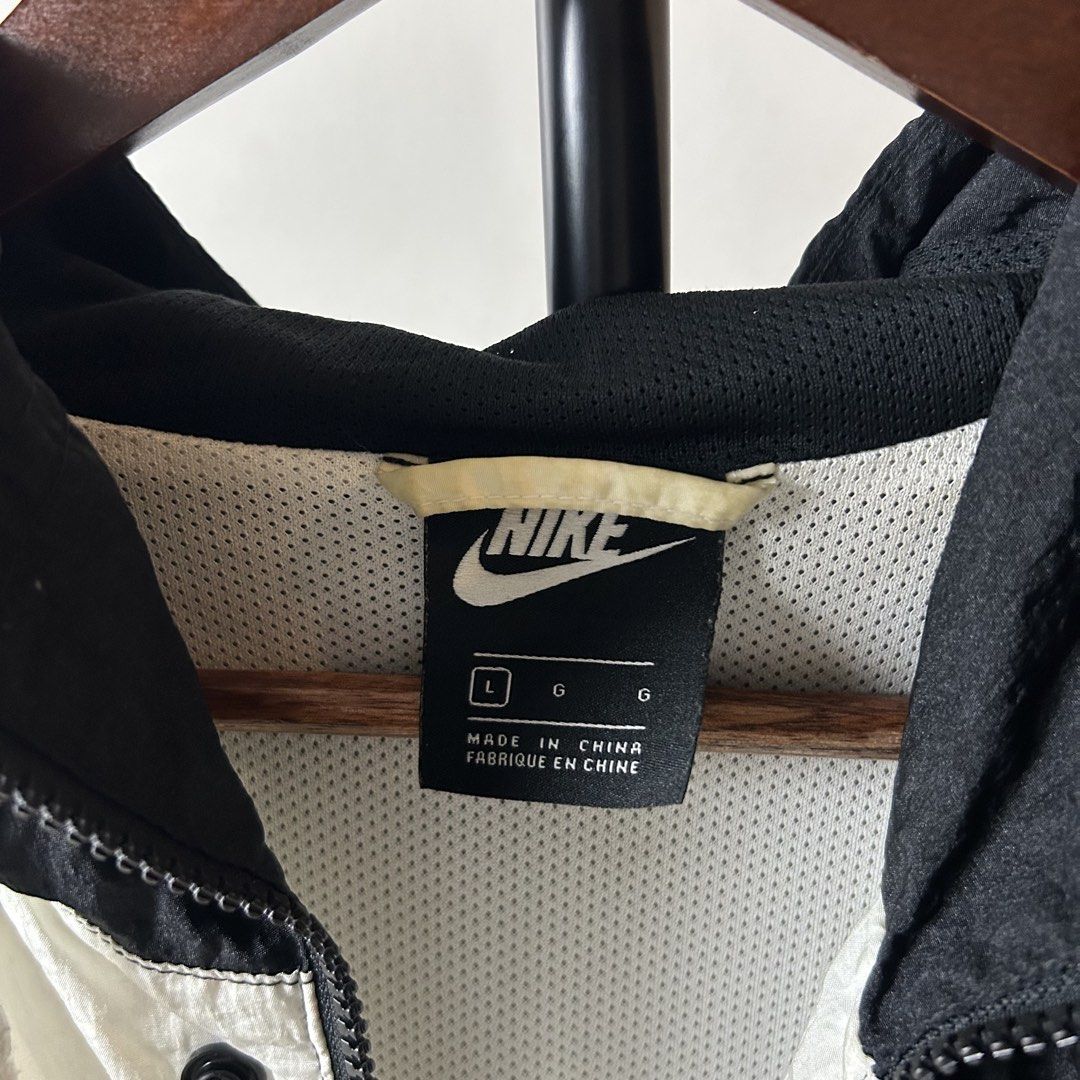 Nike Swoosh Woven Windbreaker Jacket (Category: Coats, Jackets and Outerwear) located in Bacolod City. Submitted by dashloots (Listing ID 1468880421, Image 3). Description: Nike Swoosh Woven Windbreaker Jacket Black & White colorway Large on tag W-24.5’ , L-28’ Flaws: need wash Mode of delivery: (J&T) 📦 Price: 1,300 Negotiable for sure buyers! Location: Bacolod City, Negros Occ.📍.