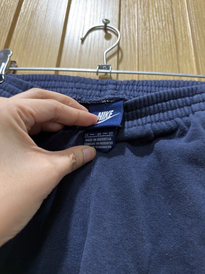 Nike Toddler Blue Sweatpants Size 3T (Category: Babies & Kids Fashion) located in Bacoor. Submitted by preloved_with_love_ (Listing ID 1468870995, Image 3). Description: - Brand: Nike - Size: 3T - Color: Navy blue - Material: Soft cotton blend - Features: Elastic waistband, side pockets, and white embroidered swoosh logo - Condition: Clean and ready to wear for everyday play - Origin: Made in Indonesia.