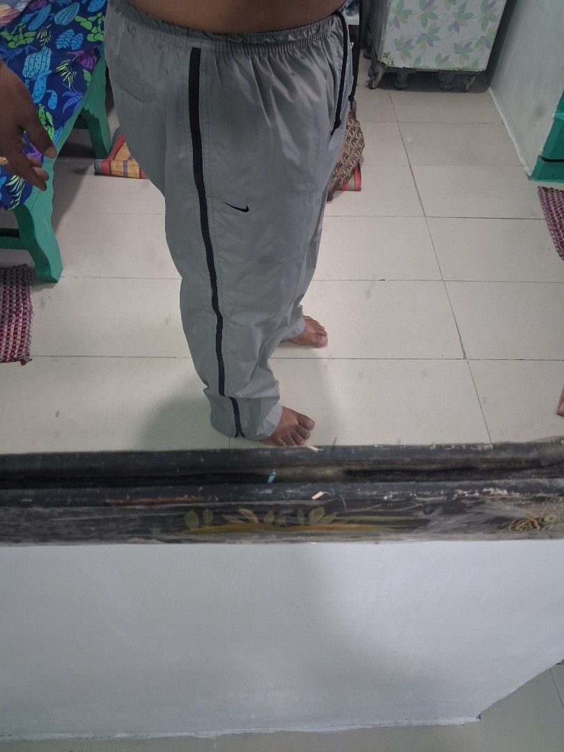 Nike track pants (Category: Announcements) located in Manila. Submitted by carlitoboh66625 (Listing ID 1468762719, Image 3). Description: nike track pants excellent all details declare width 16 length 37 hem 8 size 32 up to 389 price 850.
