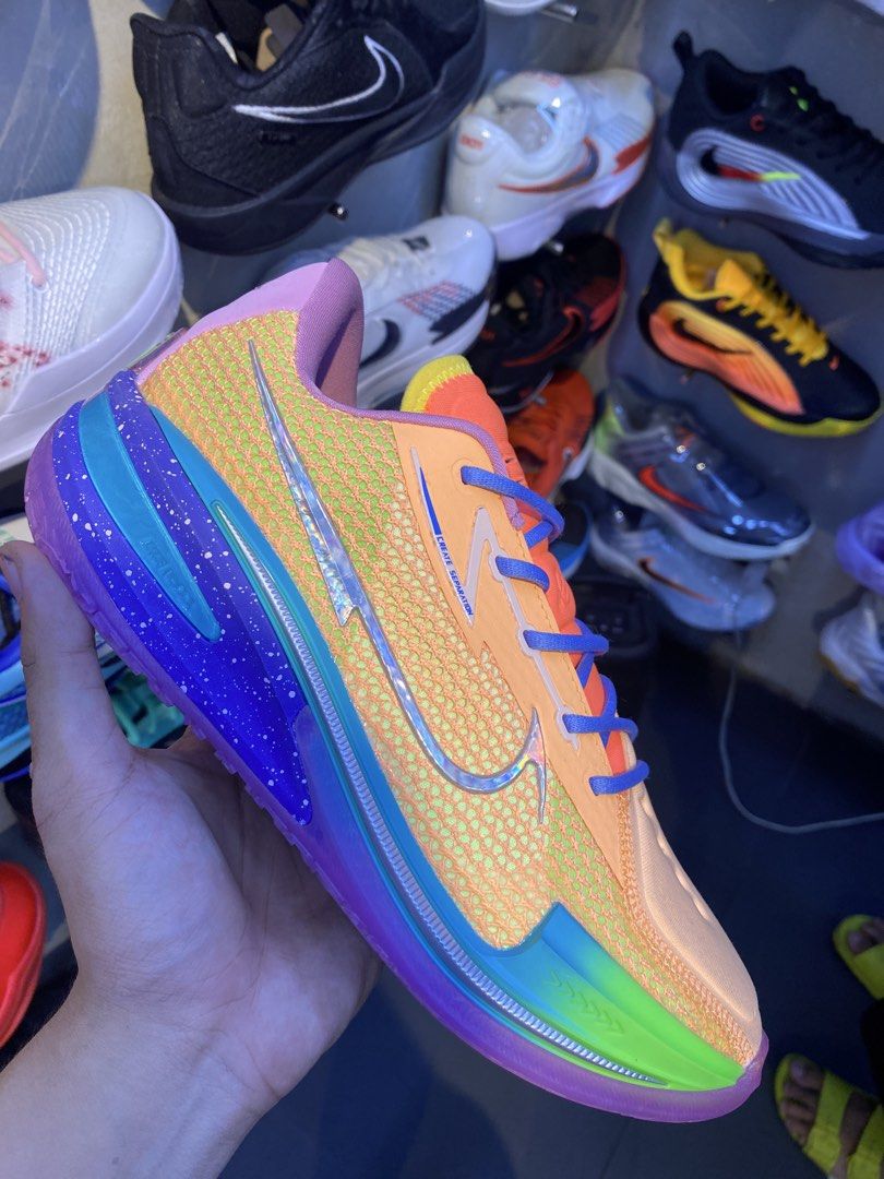 Nike UA gt cut 1 dylan harper (Category: Sneakers) located in Makati City. Submitted by rap_thrift23 (Listing ID 1468862426, Image 1). Description: - Eye-catching multi-color gradient design for the court - Breathable orange mesh upper with blue laces - Bright purple and blue speckled midsole - Silver swoosh details with '001' side branding and 'BEYOND' heel tab - Perfect mix of style and performance for your next game.