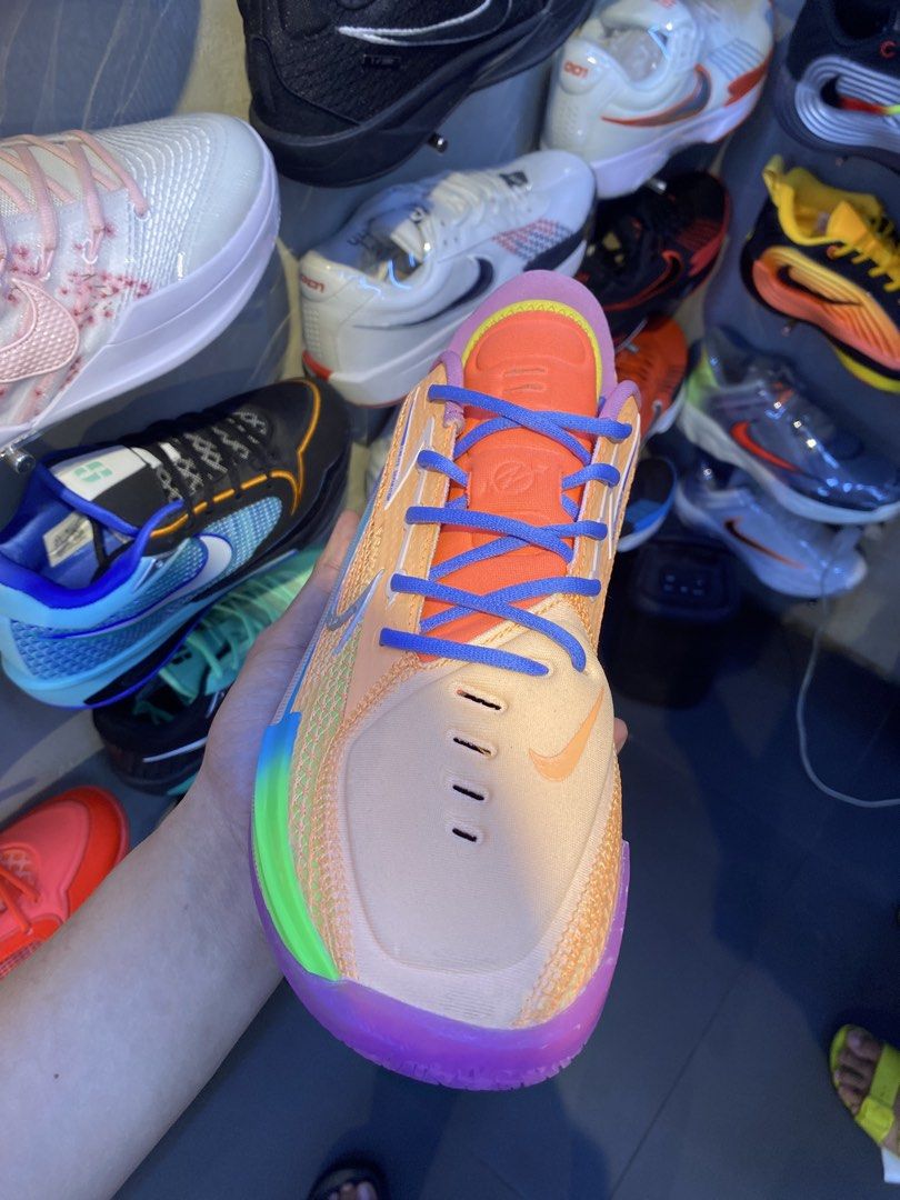 Nike UA gt cut 1 dylan harper (Category: Sneakers) located in Makati City. Submitted by rap_thrift23 (Listing ID 1468862426, Image 2). Description: - Eye-catching multi-color gradient design for the court - Breathable orange mesh upper with blue laces - Bright purple and blue speckled midsole - Silver swoosh details with '001' side branding and 'BEYOND' heel tab - Perfect mix of style and performance for your next game.