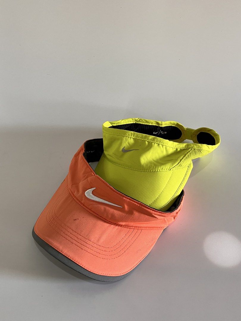 Nike Visors Cap (Category: Hats & Beanies) located in Malaybalay. Submitted by haulsome (Listing ID 1468852284, Image 2). Description: Nike Visors Cap -Both are in good conditions -Light orange and neon green -Adult size, adjustable strap velcro 450php for both, +sf.