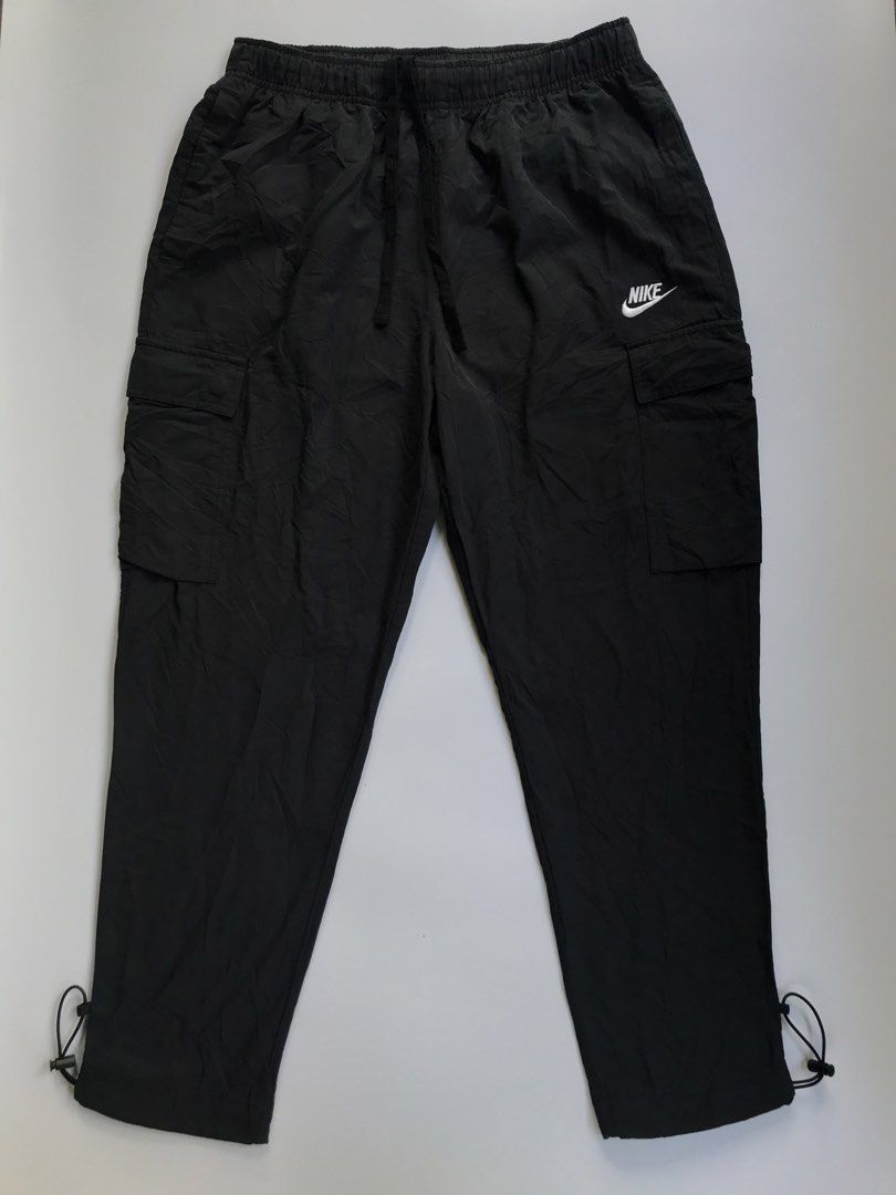NIKE WOVEN CARGO PANTS (Category: Joggers) located in Aurora. Submitted by thrillthriftfinds123 (Listing ID 1468856022, Image 2). Description: NIKE WOVEN CARGO PANTS🔥 SIZE MEDIUM NO ISSUE GOOD CONDITION SOLID NITO GUYS 9.5 COLOR RATE .