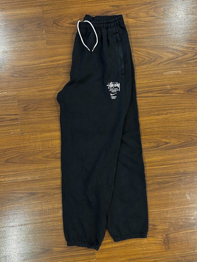 Nike x Stüssy Black Sweatpants (Category: Joggers) located in Manila. Submitted by 144thrift_shits (Listing ID 1468727703, Image 2). Description: Nike X Stussy Sweat Pants (Heavy Cloth) Size on tag: Large Waist: Free size Thighs: 13 Length: 39 Color rate: 10/10 Condition: 10/10 Issue: None 🏷️: 1500 + sf.