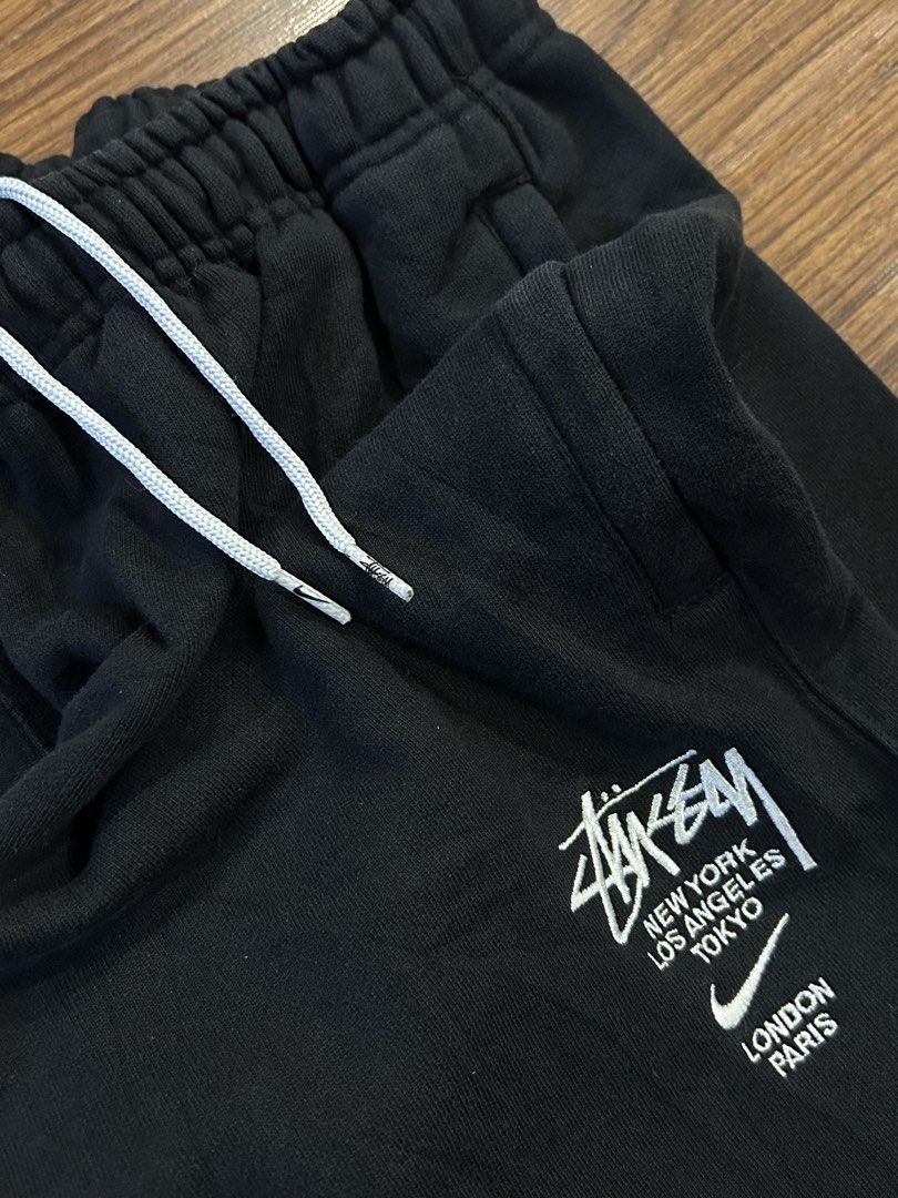 Nike x Stüssy Black Sweatpants (Category: Joggers) located in Manila. Submitted by 144thrift_shits (Listing ID 1468727703, Image 3). Description: Nike X Stussy Sweat Pants (Heavy Cloth) Size on tag: Large Waist: Free size Thighs: 13 Length: 39 Color rate: 10/10 Condition: 10/10 Issue: None 🏷️: 1500 + sf.