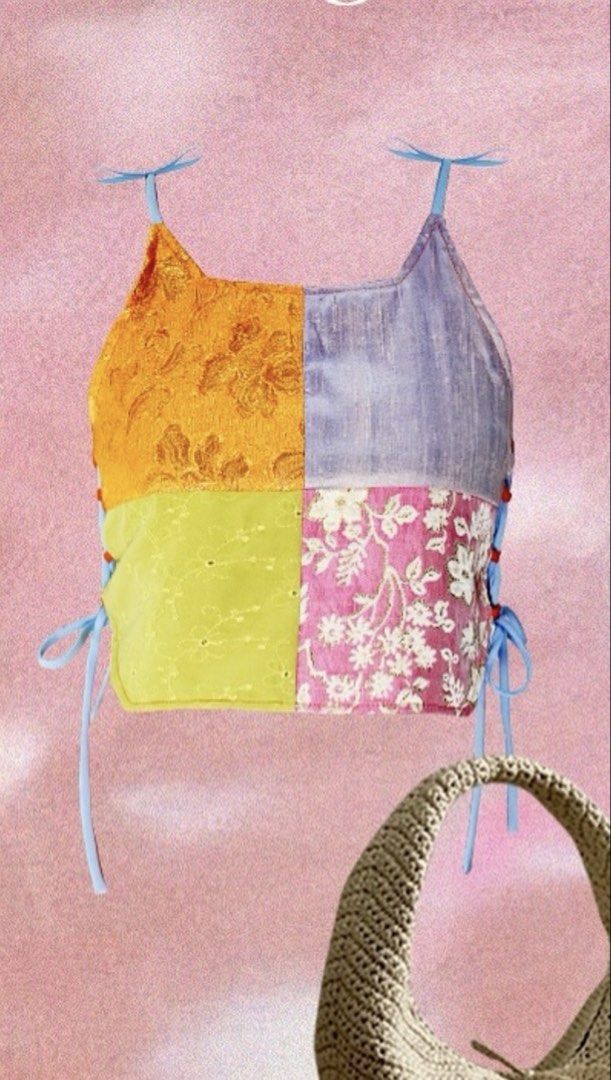 Nin & Yang Patchwork Lace-Up Crop Top M-L (Category: Sleeveless) located in Taguig. Submitted by ellajanee (Listing ID 1468767461, Image 2). Description: - Nin & Yang patchwork crop top - Multi-colored panels with orange, purple, green, and pink floral patterns - Size M-L tag attached - Adjustable tie straps at the shoulders - Side lace-up loops for a customizable fit - Unique handmade style and vibrant color combination.