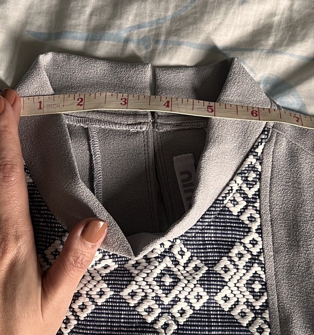 Ninabel Inabel Sleeveless Grey Inabel Front Mock Neck (Category: Sleeveless) located in Quezon City. Submitted by ninanicetohave (Listing ID 1465808131, Image 3). Description: - Style: Sleeveless top with Inabel panel mock neck and back zipper - Design: Inabelcenter pattern - Color: Grey - Size/Measurements: PTP ~15.5 inches, Length ~20 inches - Condition: Excellent, ready to wear!.