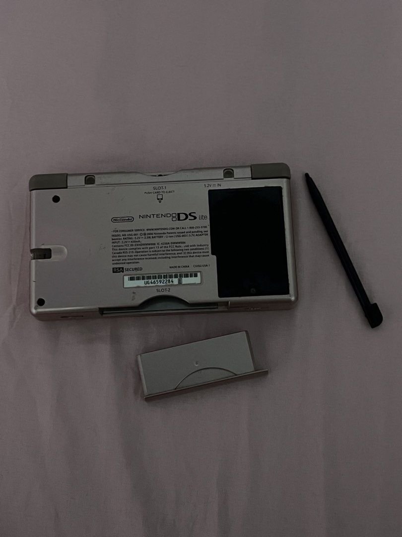 Nintendo Ds Lite Pink (Category: Nintendo) located in Manila. Submitted by milamartina123 (Listing ID 1468845511, Image 2). Description: good condition, working touch screen with pen and cover no charger and card tondo, manila loc no return/refund once settled.