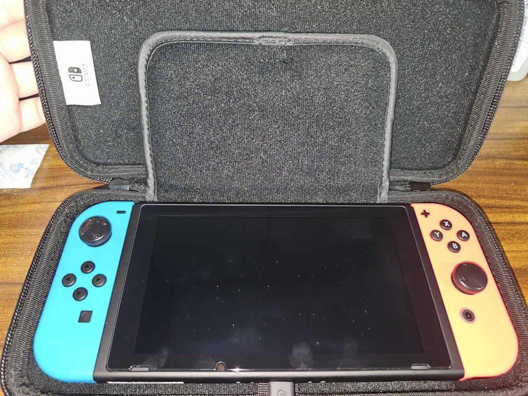Nintendo Switch Console (Category: Nintendo) located in Quezon City. Submitted by annmalabanan (Listing ID 1468817468, Image 3). Description: Console only with Complete Accessories P 11,200 Console with 4 games - P 19,300: •Pokemon Let’s Go Pikachu •Mario Kart 8 Deluxe •Overcooked! All You Can Eat •The Legend of Zelda Breath of the Wild No issues Location: Palmera Homes, Sta. Monica, QC or Linear Tower Makati.