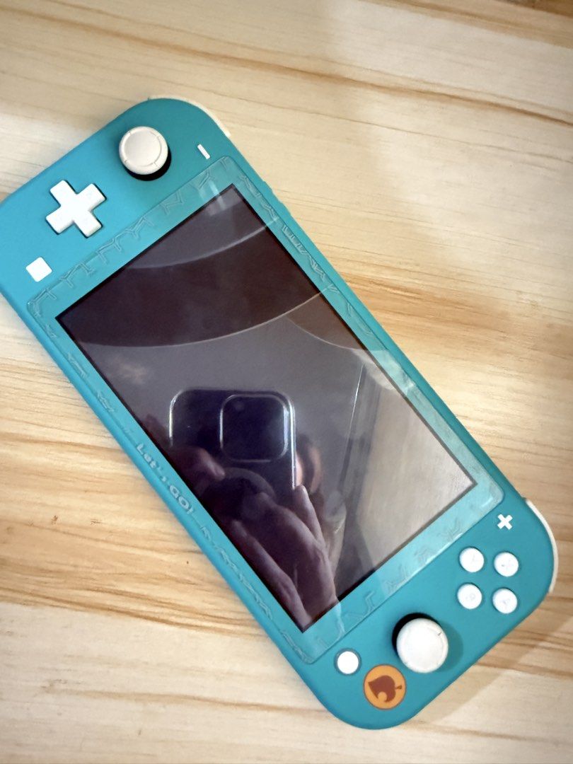 Nintendo Switch Lite - Animal Crossing (Category: Nintendo) located in San Fernando. Submitted by simplypurseandfragrances (Listing ID 1468795992, Image 1). Description: 🎮 FOR SALE: Nintendo Switch Lite – Animal Crossing Edition Price: ₱7,500 (Slightly Negotiable for Sure Buyers Only) Selling my Nintendo Switch Lite in very good condition! Smooth performance and well taken care of. Barely used and never repaired. Condition: * No joystick draft *